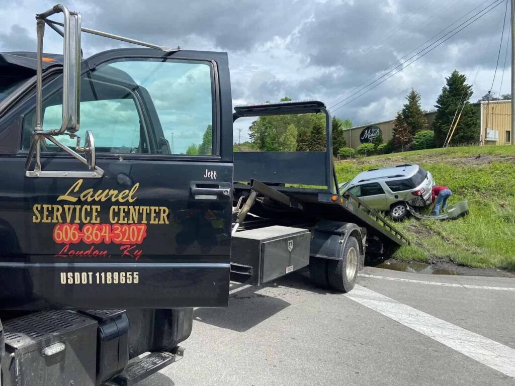Tow truck performing an off-road vehicle recovery near London, KY